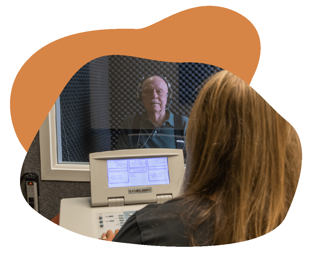 Test_Shapes_2-14 Woman giving man hearing test