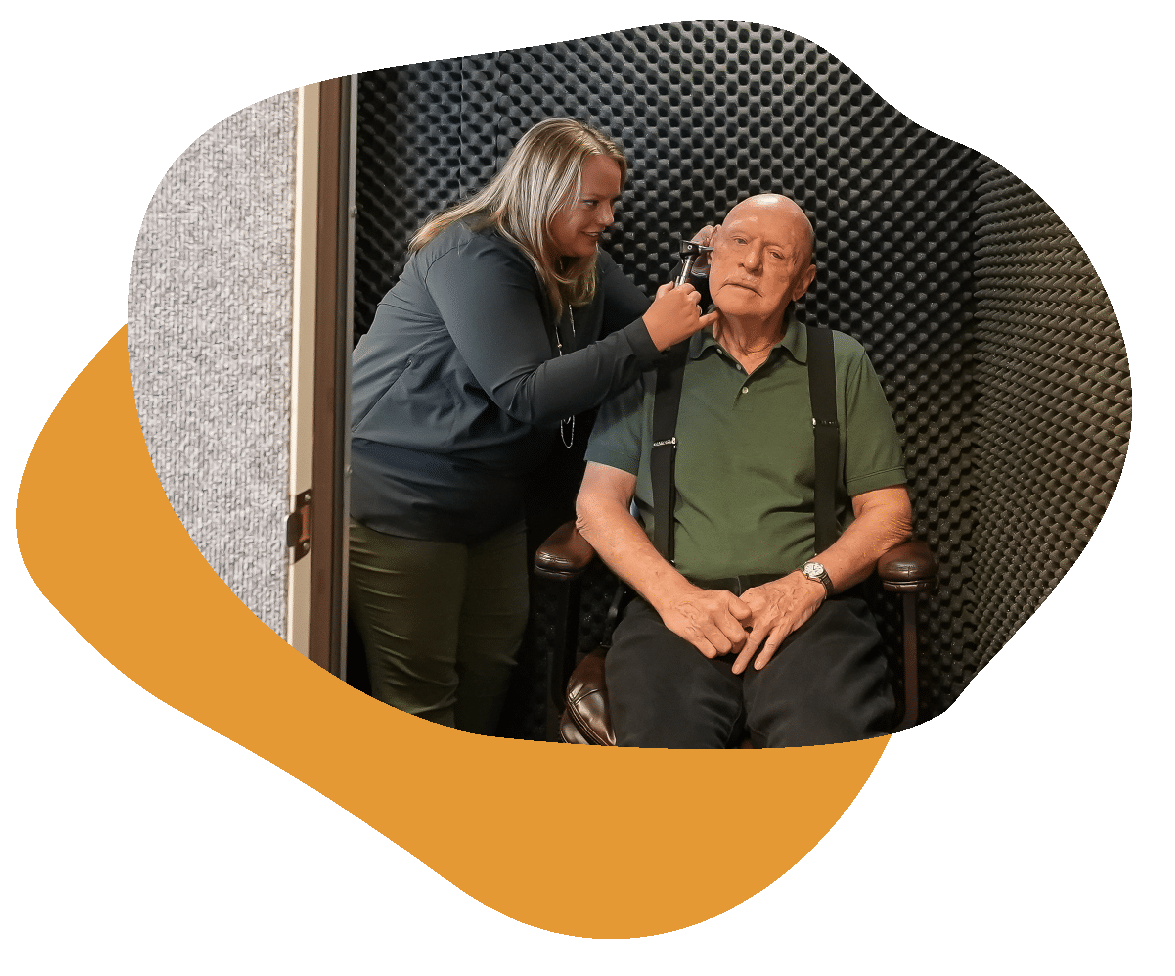 Test_Shapes_5-06 Woman testing man's hearing